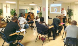 New Life Program Counselor Joe McAvinney leads a Life Skills Class on preparing financially for the future, wise money management and budgeting