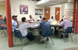 Learning Program Director Randy Baker facilitates a problem-solving discussion about real-world conflicts that arise in the workplace.